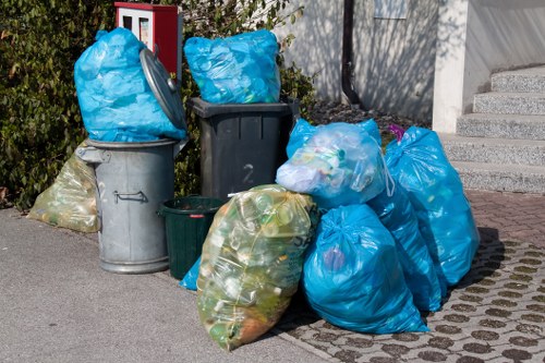 Professional clearing garden debris in Morden